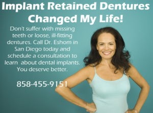 woman wearing implant retained dentures